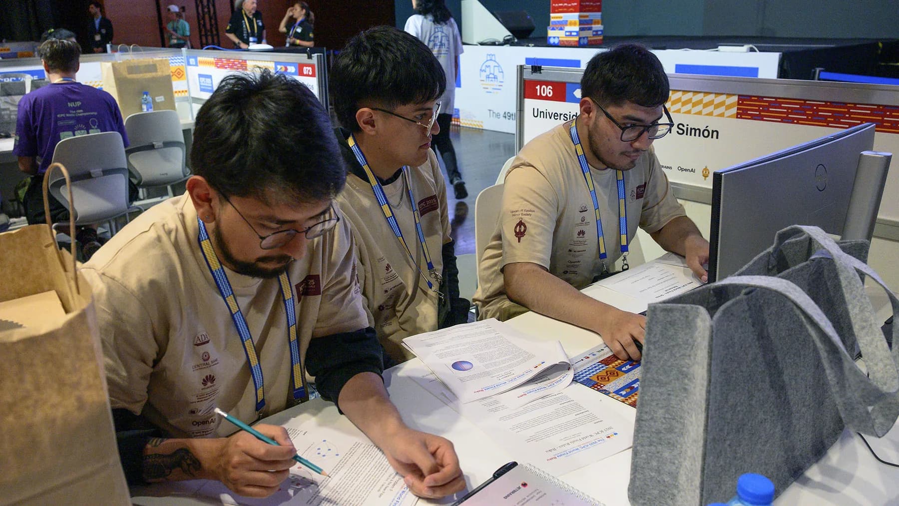 The UMSS team working together during the World Finals warm-up